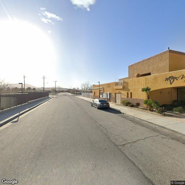 Photo of WHISPERING PALMS APTS