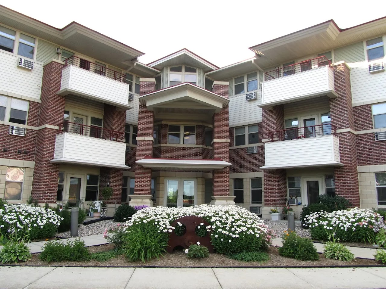 Photo of CANNERY ROW SENIOR APTS at 301 E THIRD ST WAUNAKEE, WI 53597